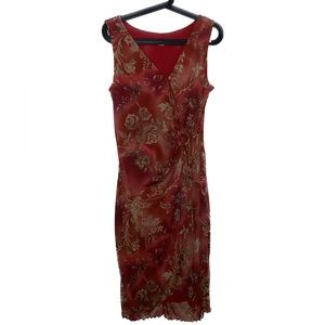 cutest red 90’s dress adorned with gold flowers. frilly bottom detail